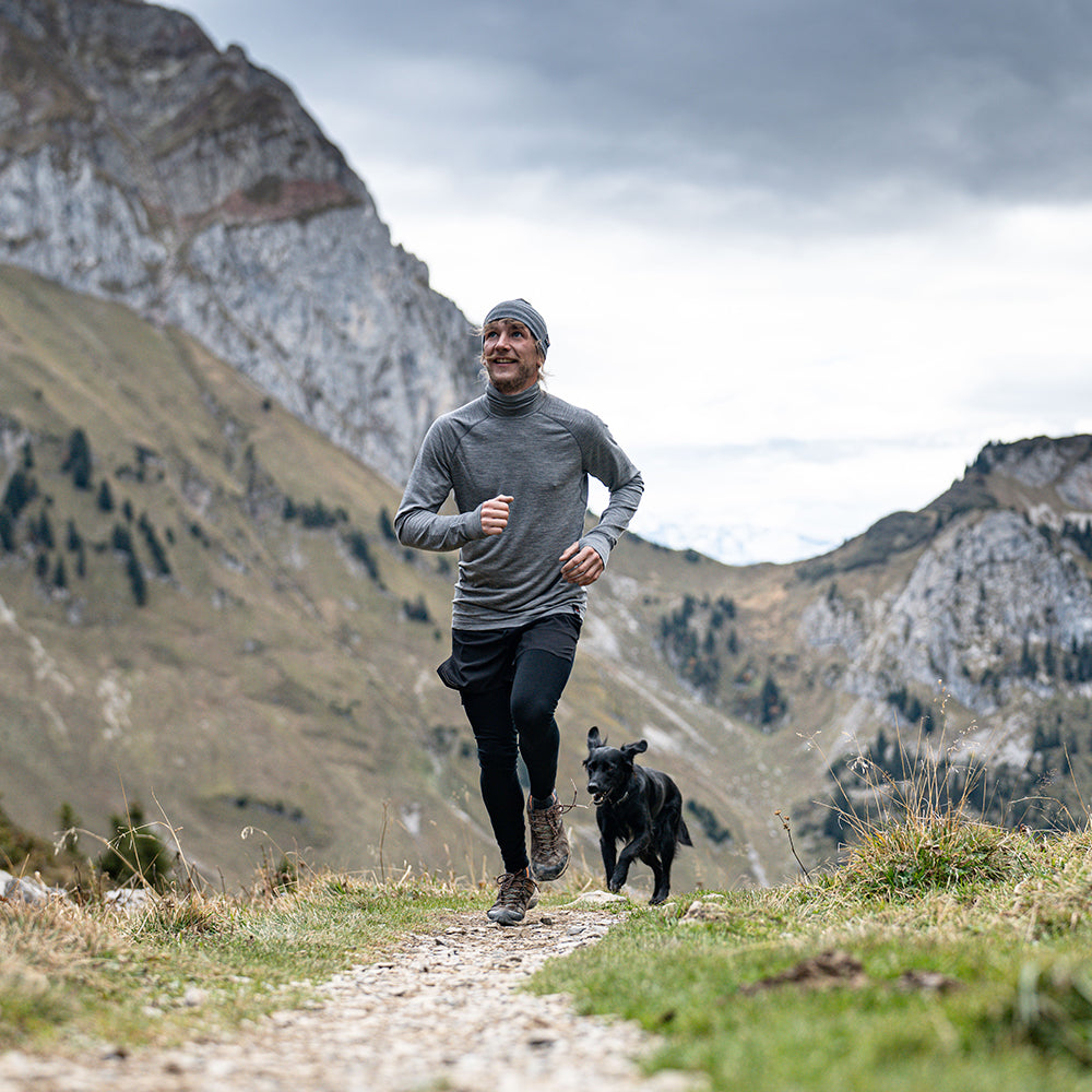 Isobaa | Mens 160 Merino Active Roll Neck (Charcoal Melange) | Embrace the chill in style with our Men's 160 Merino Active Roll Neck, crafted from 160g 18.5 micron superfine merino wool | Model: Baudoin