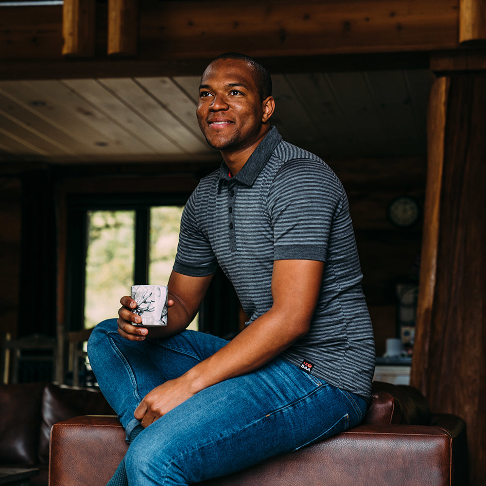 Isobaa | Mens Merino 180 Short Sleeve Polo Shirt (Stripe Smoke/Charcoal) | The ultimate Merino wool polo – perfect for weekend hikes, bike commutes, post-adventure coffee stops, office days, and everything in-between. | Model: Edirin