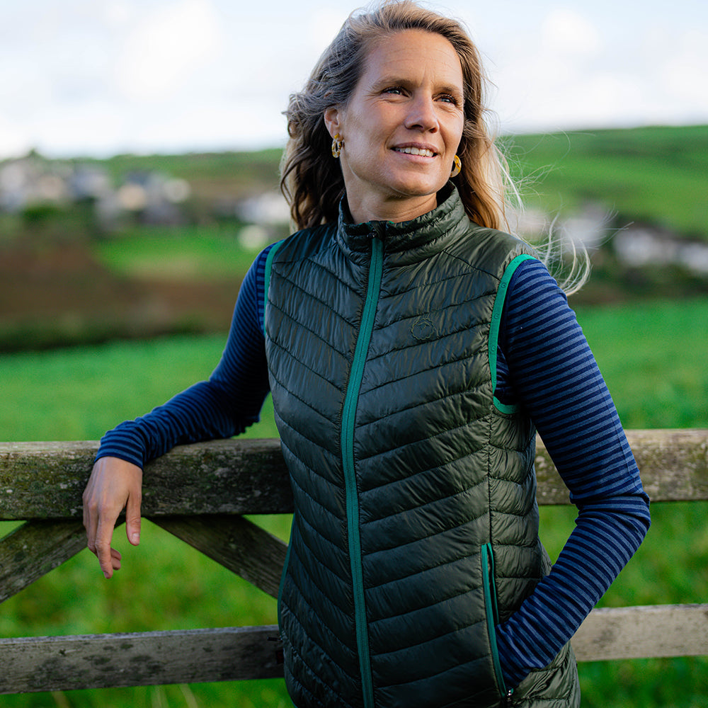Isobaa | Womens Merino Wool Insulated Gilet (Forest/Green) | Fight the chill with our innovative Merino gilet. | Model: Amy