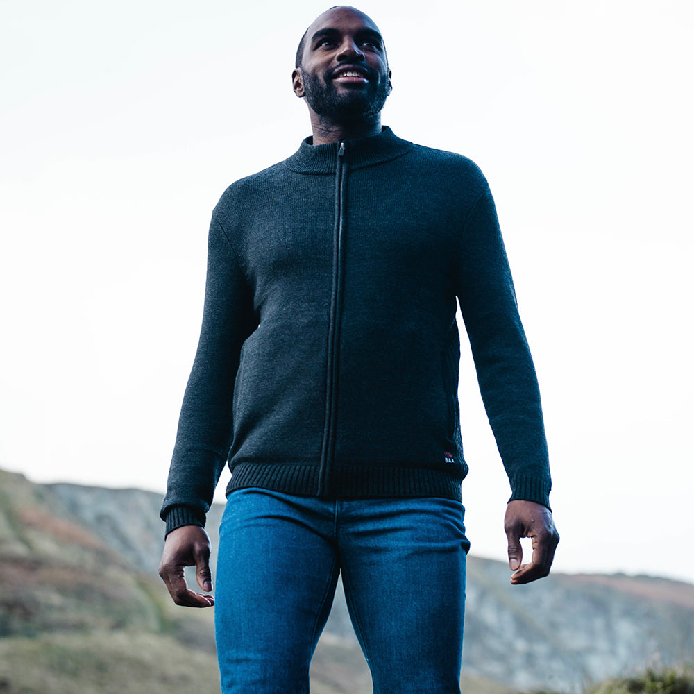 Isobaa | Mens Merino Zip Sweater (Black) | Discover exceptional warmth, comfort, and everyday versatility with our extrafine Merino wool sweater. | Model: Michael
