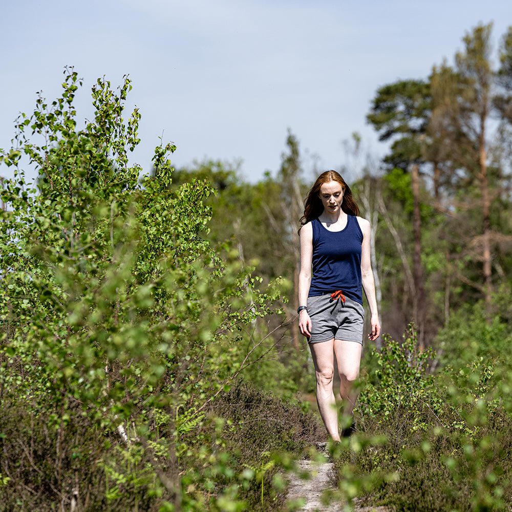 Isobaa | Womens Merino 150 Vest (Navy) | Be ready for any adventure with Isobaa's superfine Merino sleeveless Vest. | Model: Sophie