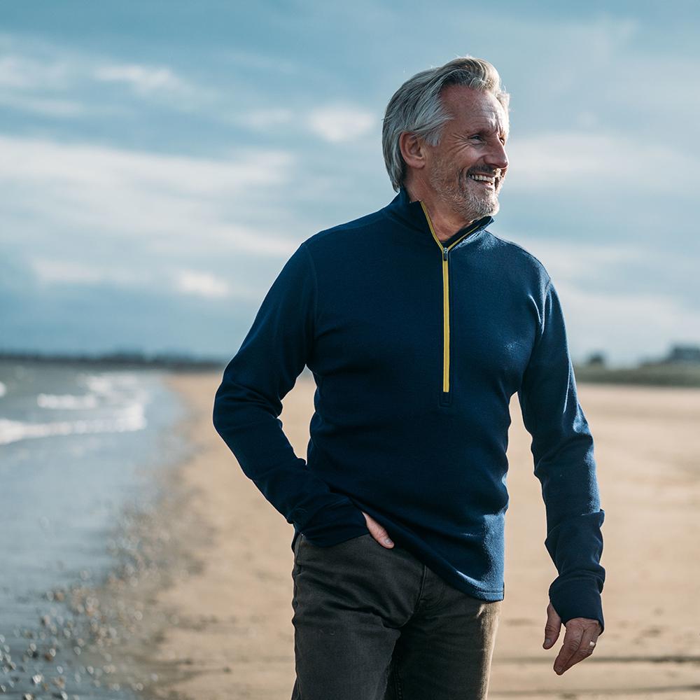 Isobaa | Mens Merino 320 Long Sleeve Half Zip (Navy/Lime) | Conquer cold trails, blustery commutes, and unpredictable weather with the ultimate Merino wool half-zip top. | Model: Simon