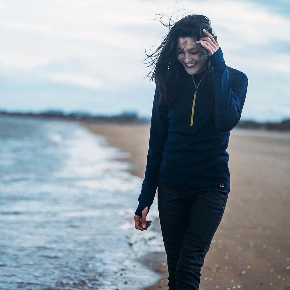 Isobaa | Womens Merino 320 Long Sleeve Half Zip (Navy/Lime) | Conquer cold trails, blustery commutes, and unpredictable weather with the ultimate Merino wool half-zip top. | Model: Jessica