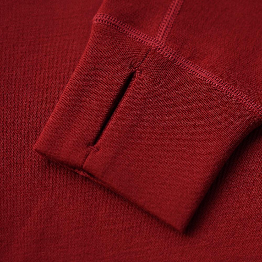 Isobaa | Womens Merino 320 Long Sleeve Half Zip (Red/Orange) | Conquer cold trails, blustery commutes, and unpredictable weather with the ultimate Merino wool half-zip top.
