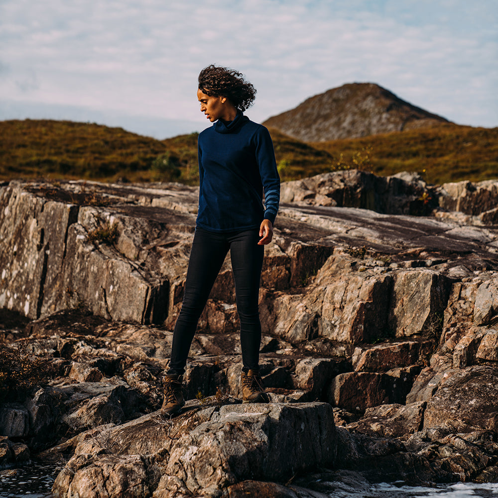 Isobaa | Womens Merino Roll Neck Sweater (Navy/Denim) | Discover premium style and performance with Isobaa's extra-fine Merino roll neck sweater. | Model: Micah
