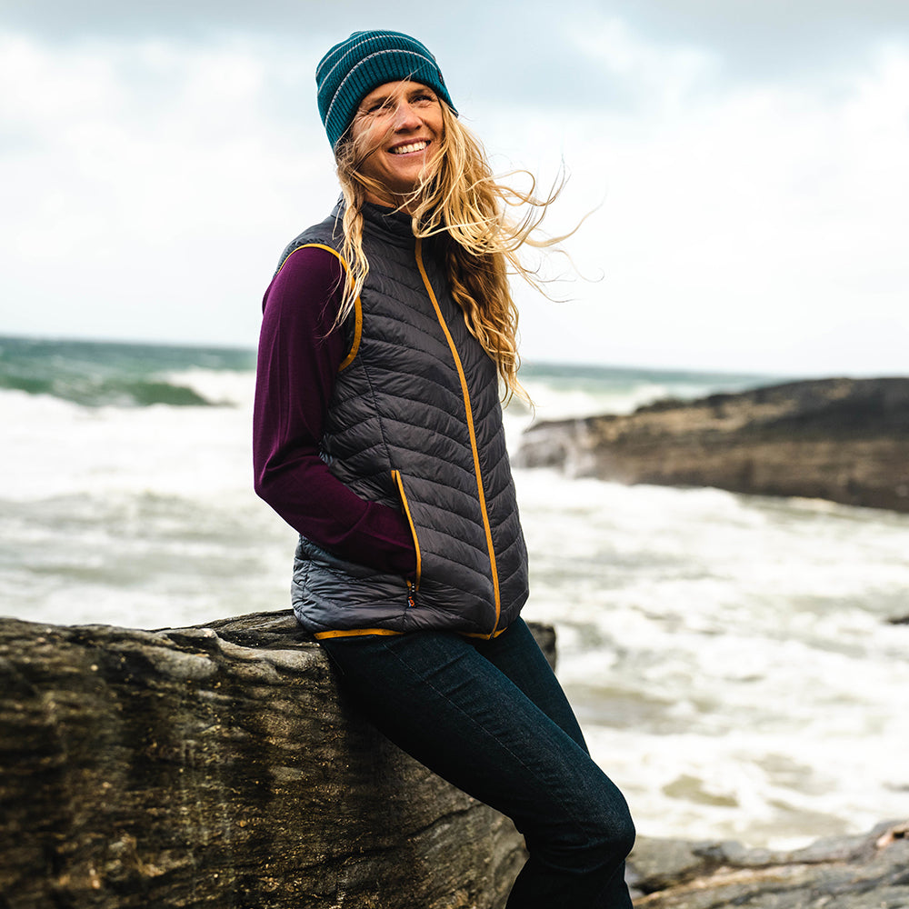 Isobaa | Womens Merino Wool Insulated Gilet (Smoke/Mustard) | Fight the chill with our innovative Merino gilet. | Model: Amy