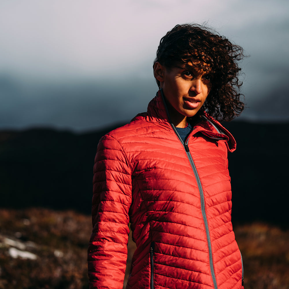 Isobaa | Womens Merino Wool Insulated Jacket (Red/Smoke) | Innovative and sustainable design with our Merino jacket. | Model: Micah
