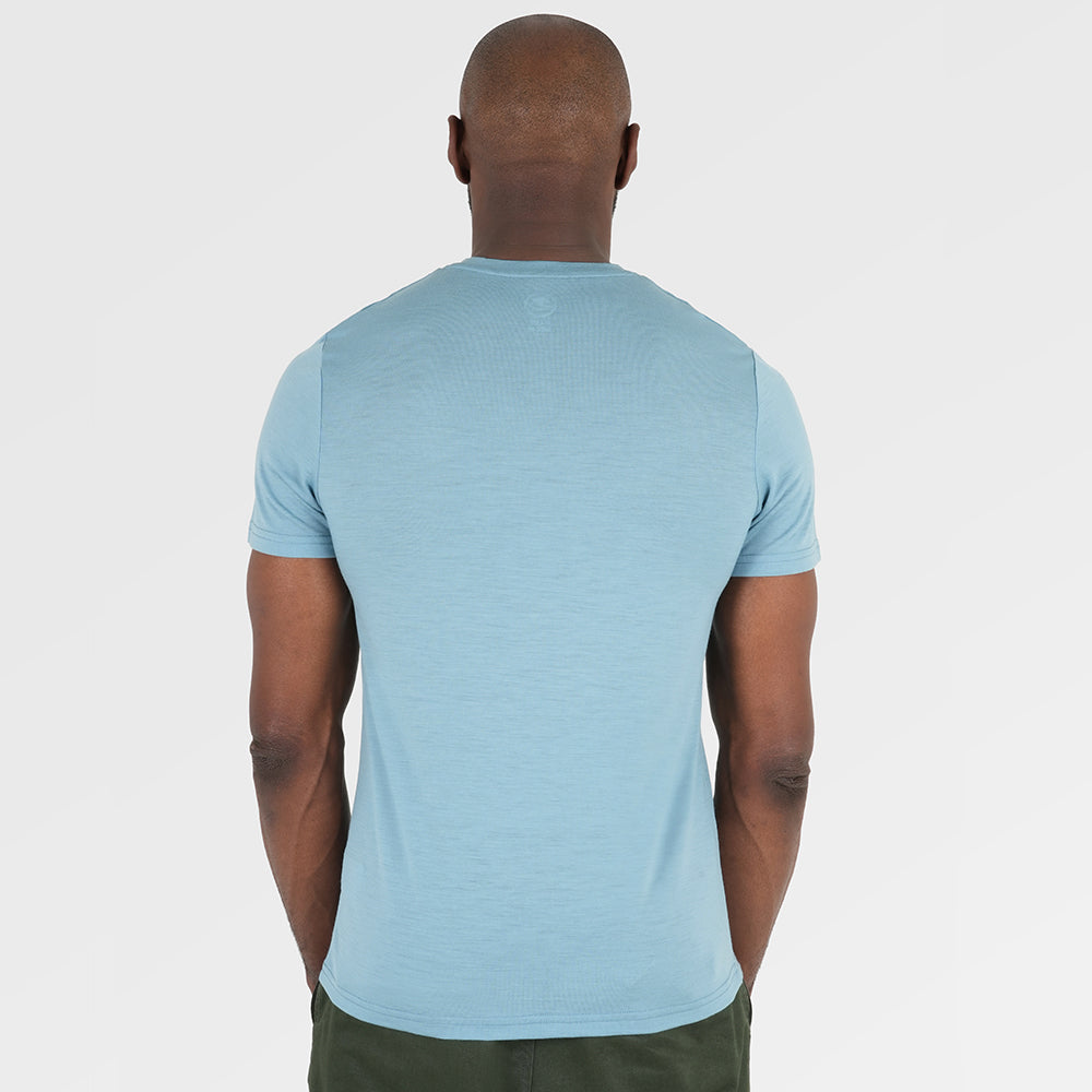 Mens Merino 150 Stamp Summit Tee (Lagoon/Jute) | Model: Michael