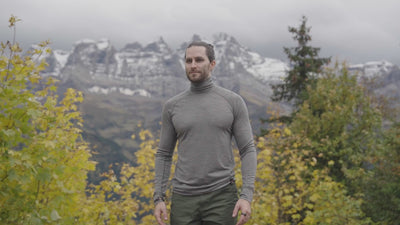 Isobaa | Mens 160 Merino Active Roll Neck (Charcoal Melange) | Embrace the chill in style with our Men's 160 Merino Active Roll Neck, crafted from 160g 18.5 micron superfine merino wool | align: 40% 45% | Model: Ed