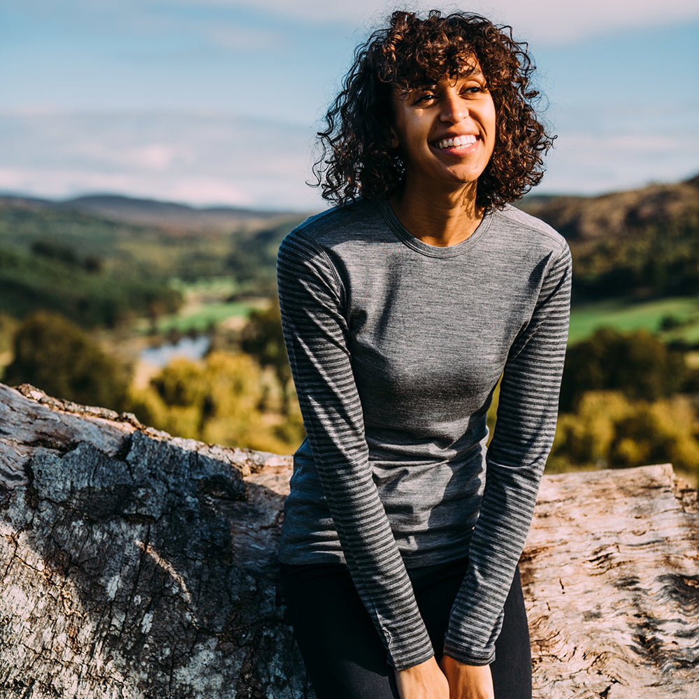 Isobaa | Womens Merino 180 Long Sleeve Crew (Stripe Charcoal/Smoke) | Get outdoors with the ultimate Merino wool long-sleeve top. | Model: Micah