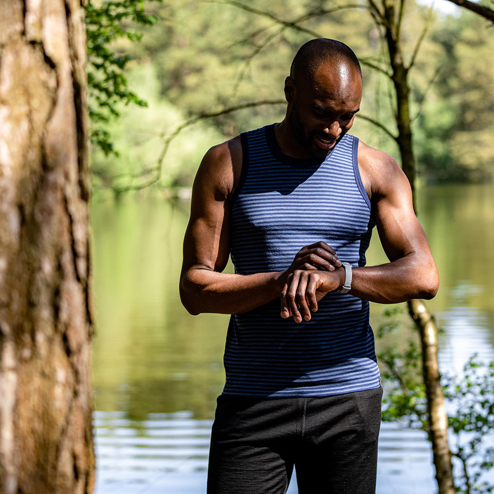 Isobaa | Mens Merino 150 Vest (Mini Stripe Navy/Denim) | Be ready for any adventure with Isobaa's superfine Merino sleeveless Vest. | Model: Michael