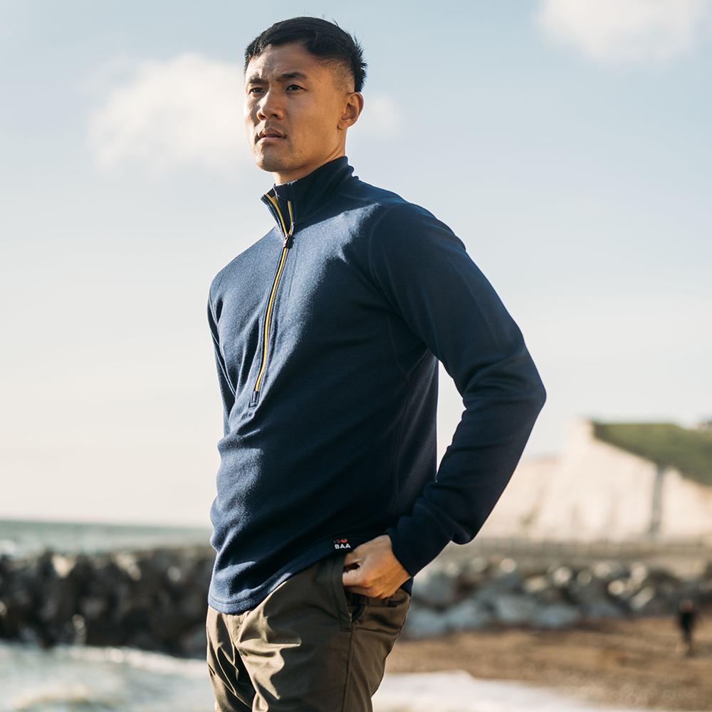 Isobaa | Mens Merino 320 Long Sleeve Half Zip (Navy/Lime) | Conquer cold trails, blustery commutes, and unpredictable weather with the ultimate Merino wool half-zip top. | Model: Donald