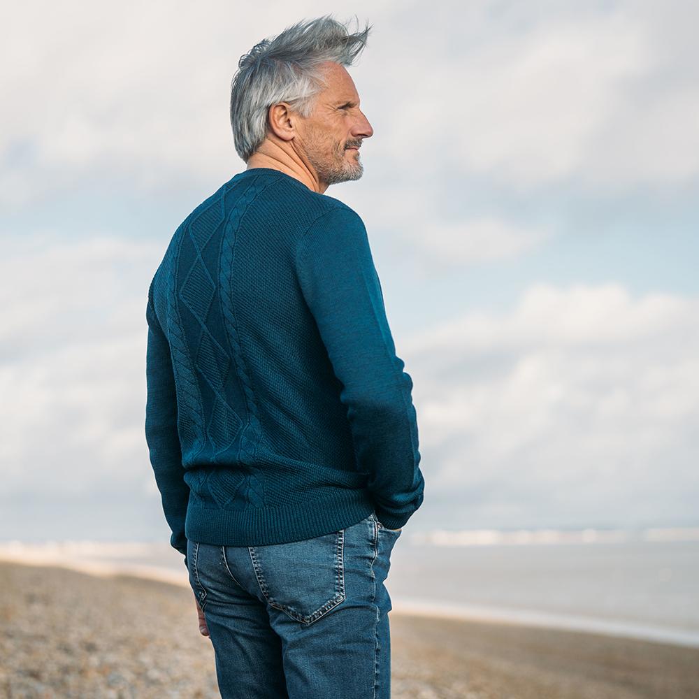 Isobaa | Mens Merino Cable Sweater (Petrol) | Experience timeless style and outdoor-ready performance with our Merino wool crew neck sweater. | Model: Simon