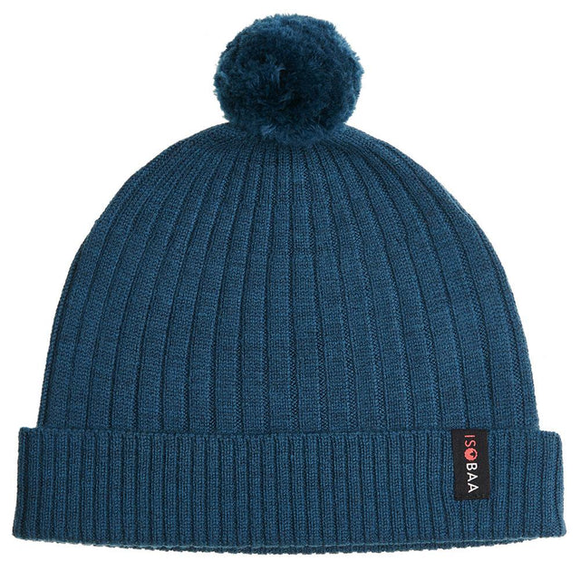 Isobaa | Merino Bobble Beanie (Petrol) | Stay warm and stylish with Isobaa's extra-fine Merino bobble beanie! Its cosy warmth, playful bobble, and classic rib-knit design will make it your go-to winter essential for hikes, city strolls, and everything in between.
