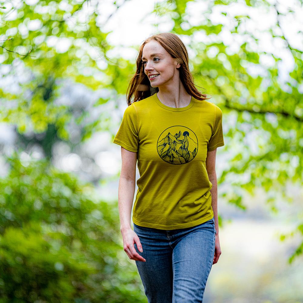 Isobaa | Womens Merino 150 Mountains Tee (Lime) | Gear up for adventure with our superfine Merino Tee. | Model: Sophie