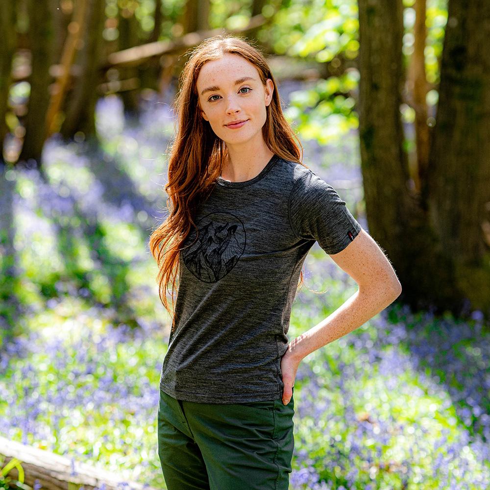 Isobaa | Womens Merino 150 Mountains Tee (Smoke) | Gear up for adventure with our superfine Merino Tee. | Model: Sophie