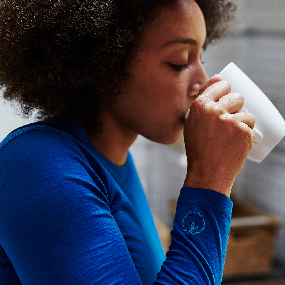 Isobaa | Womens Merino 180 Long Sleeve Crew (Blue) | Get outdoors with the ultimate Merino wool long-sleeve top. | Model: Savanah