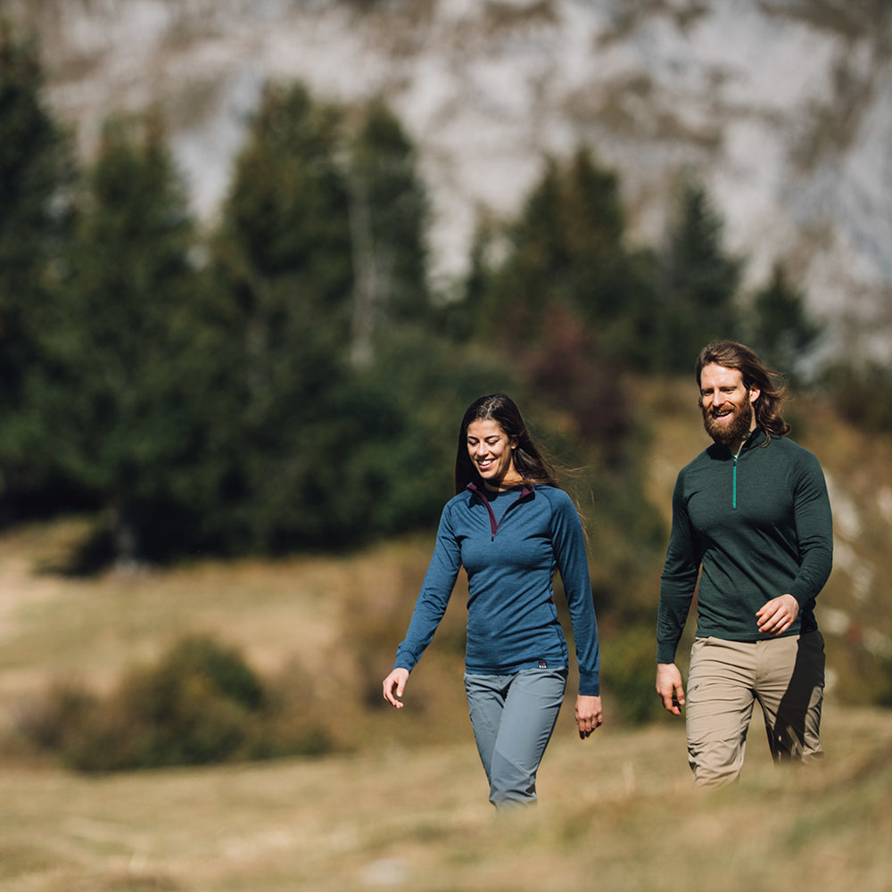 Isobaa | Womens Merino 200 Long Sleeve Zip Neck (Denim) | Experience the best of 200gm Merino wool with this ultimate half-zip top – your go-to for challenging hikes, chilly bike commutes, post-workout layering, and unpredictable weather. | Model: Jess