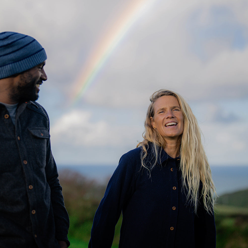 Isobaa | Womens Merino Blend Mountain Shirt (Navy) | Conquer trails, peaks, and urban adventures with this high-performance Merino blend overshirt. | Model: Amy