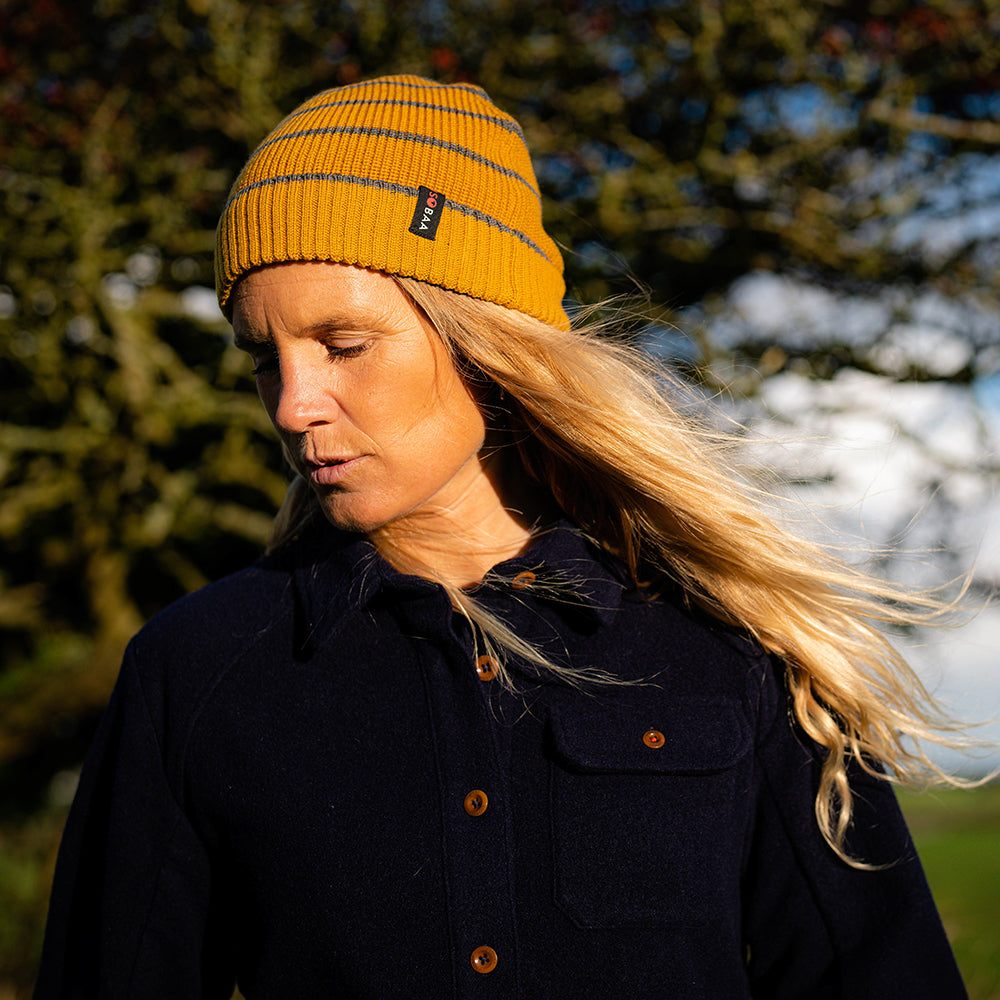 Isobaa | Womens Merino Blend Mountain Shirt (Navy) | Conquer trails, peaks, and urban adventures with this high-performance Merino blend overshirt. | Model: Amy