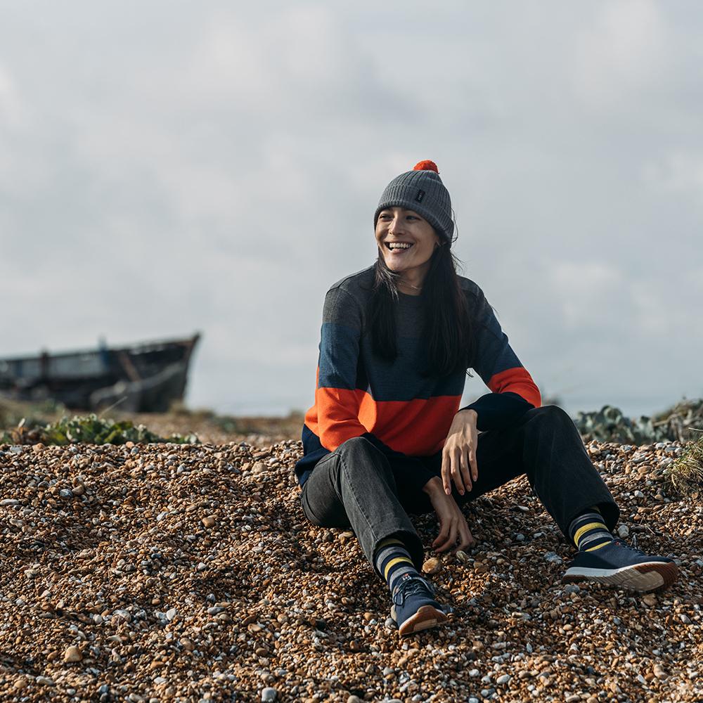 Isobaa | Womens Merino Block Stripe Sweater (Smoke/Denim/Orange/Navy) | Discover effortless style and exceptional comfort with our  extrafine 9-gauge Merino wool crew neck sweater. | Model: Jessica