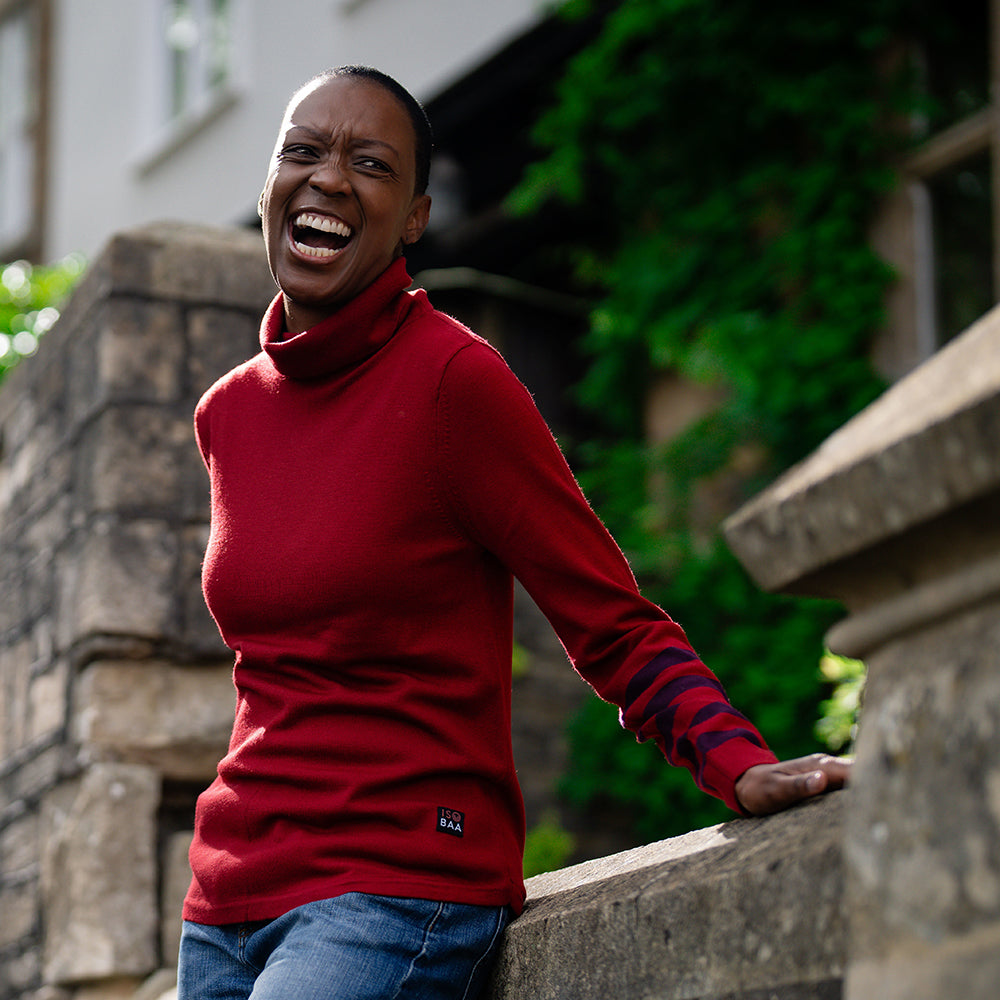 Isobaa | Womens Merino Roll Neck Sweater (Red/Wine) | Discover premium style and performance with Isobaa's extra-fine Merino roll neck sweater. | Model: Yolisa