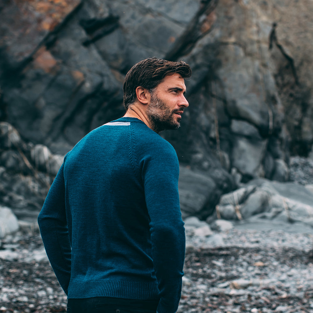 Isobaa | Mens Merino Crew Sweater (Petrol/Sky) | Everyday warmth and comfort with our superfine 12-gauge Merino wool crew neck sweater. | Model: Duncan